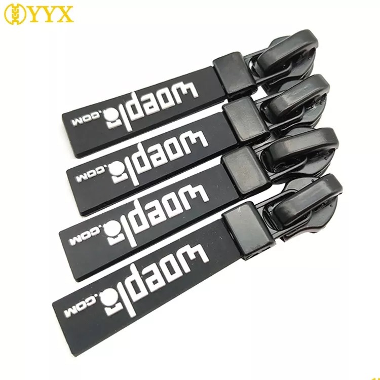 YYX custom embossed silicone soft PVC logo zipper puller for garments bag access